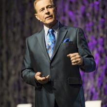 Gary Young on stage at Young Living Convention